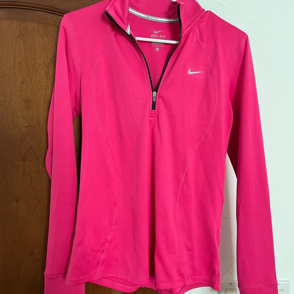 Nike women’s Dri-Fit pullover, hot pink.